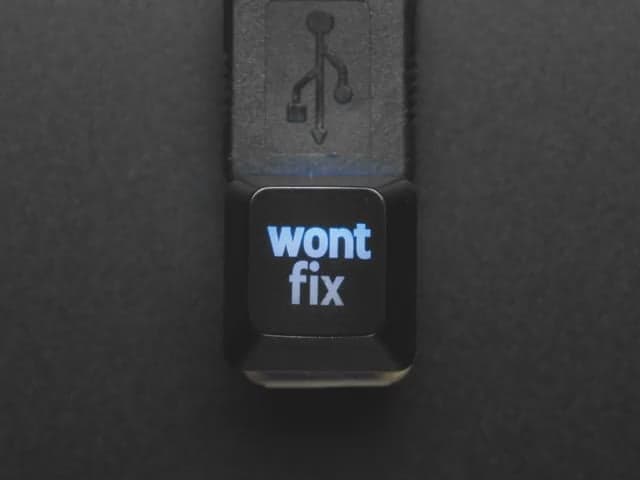 Etched Glow-Through Keycap with "wont fix" Text